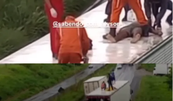 Homem cai de passarela em cima de caminhão na BR-324